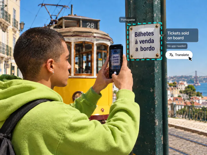 Young man at a Lisbon tram stop photographing a Portuguese notice, translated in the browser with no app