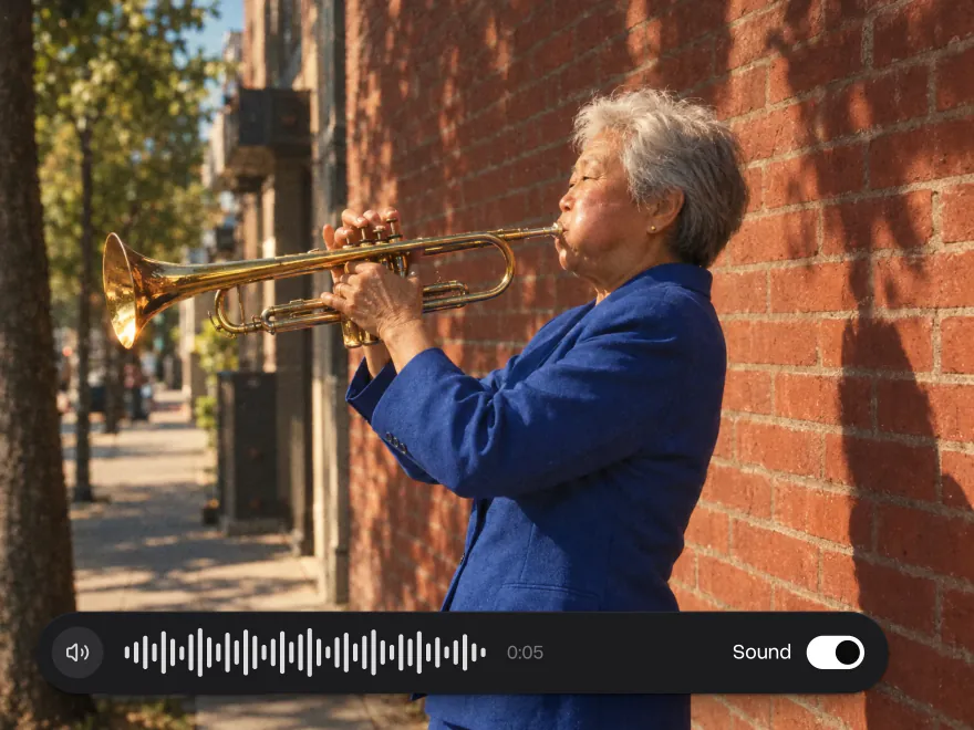 A woman playing the trumpet on a street corner, the sound waveform with Sound on next to it